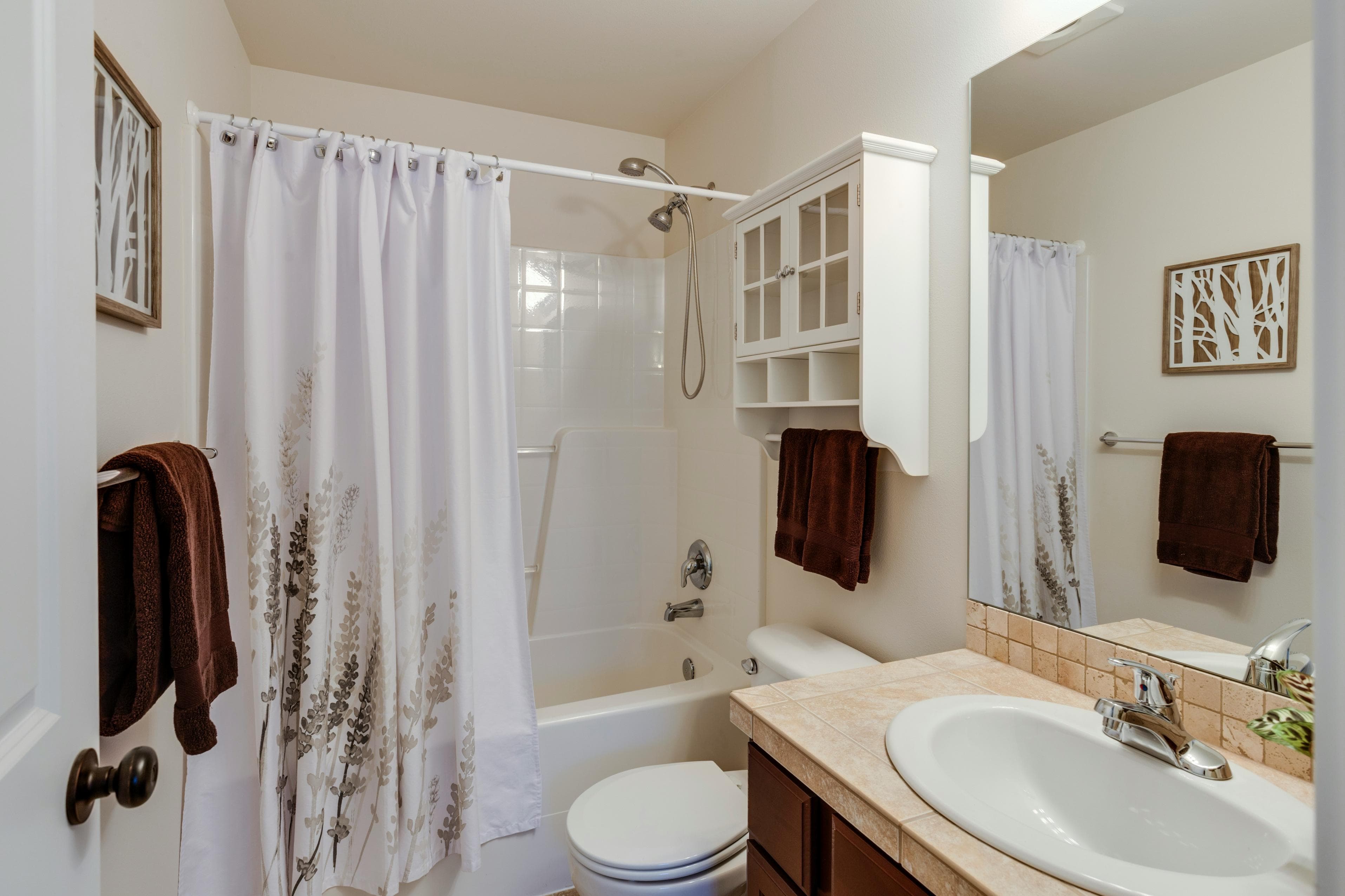 How High Should You Hang a Shower Curtain? (The Trick to Making a Small Bathroom Look Taller) — Bathroom. Learn how high to hang a shower curtain so a small bat